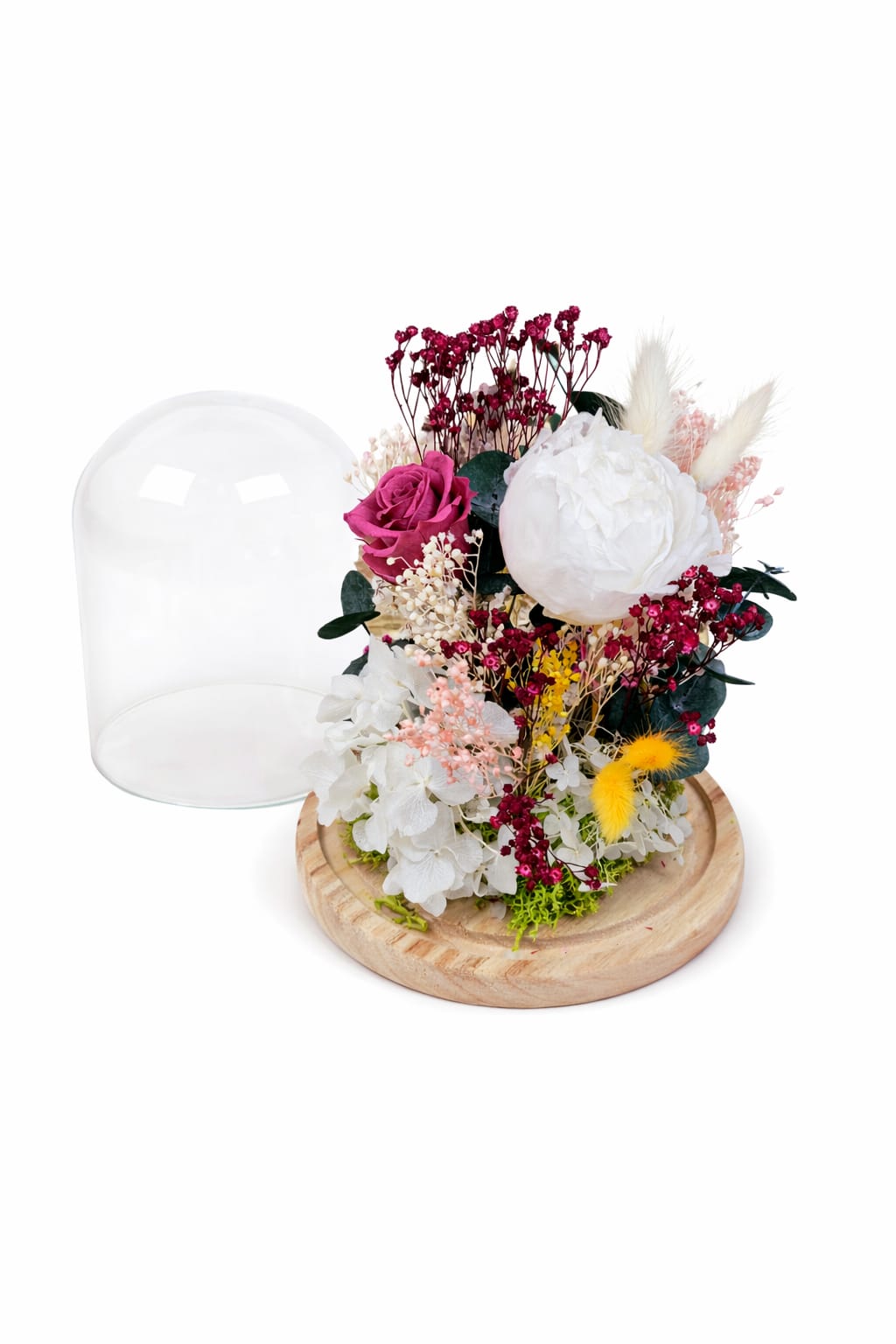 Arreglo de flores preservadas y secas sobre base de madera con cúpula de cristal desmontable