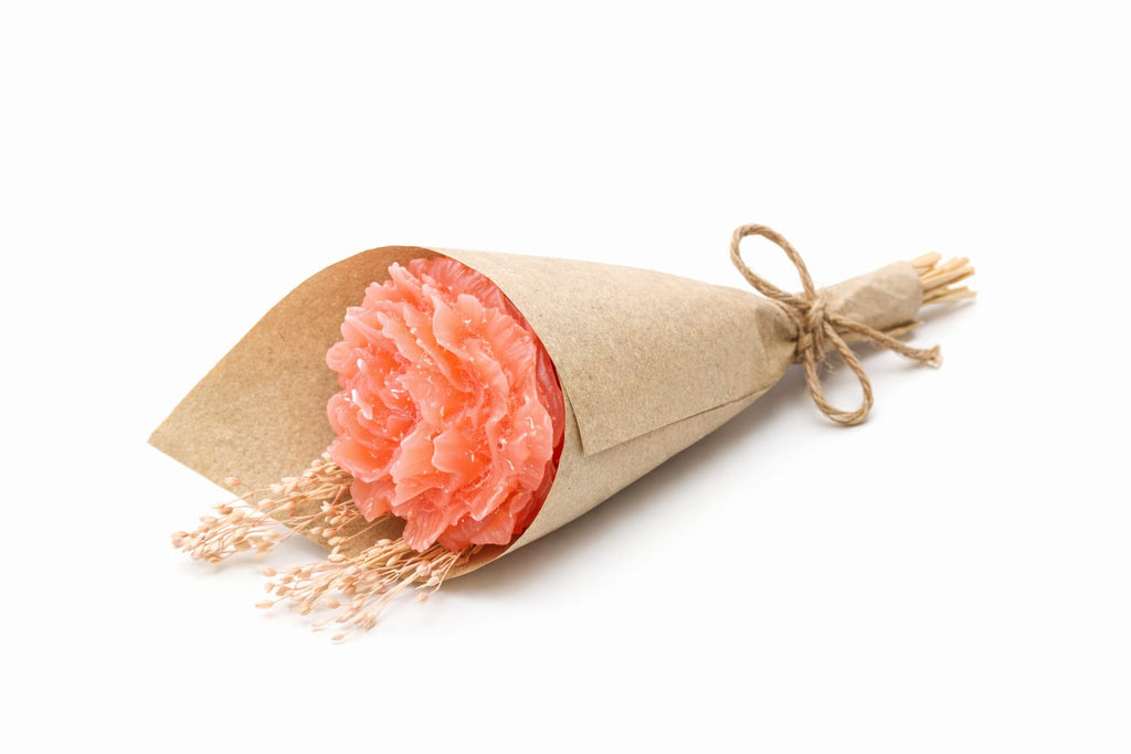 Vela decorativa en forma de flor rosa presentada como ramo, regalo romántico para San Valentín